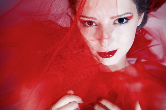 Girl in red tulle