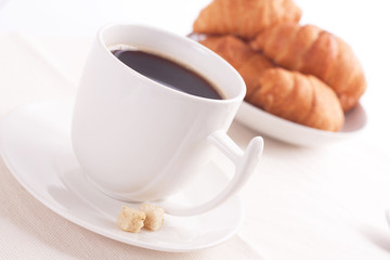 breakfast with croissants and coffee