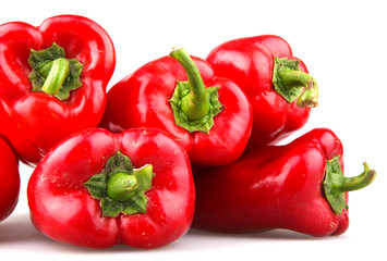 Red chilli peppers on white background