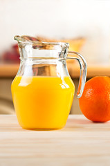 Orange juice in a glass jar