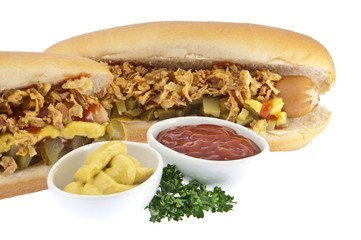 Hot Dog with sauces in bowls (clipping paths)