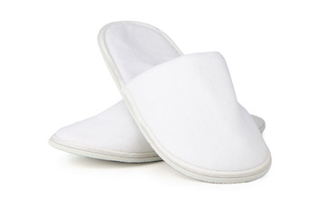A pair of white slippers - obrazy, fototapety, plakaty