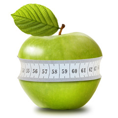 Green apple with measurement isolated on white