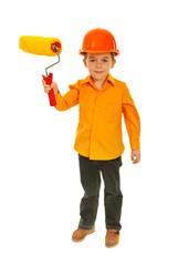 Kid boy holding paint roller