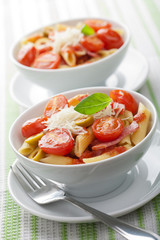 pasta with tomatoes and salami