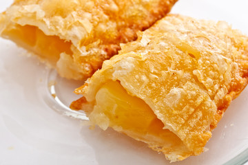 crispy apple pie on glass plate