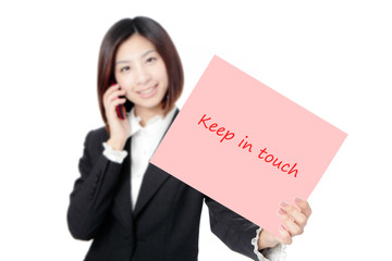 Business woman speaking phone and take paper