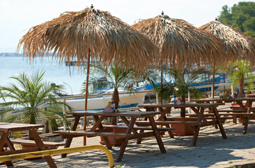 Fototapeta premium Restaurant tables at sea shore