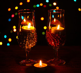Amazing composition of candles and glasses