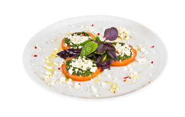 appetizer with tomato,cheese and pesto