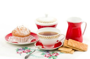 Beautiful tea set with cupcakes