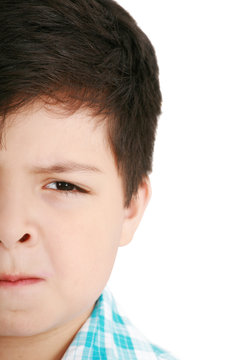 Worried little boy isolated on a white background