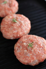 Hamburger on grill pan for cooking image