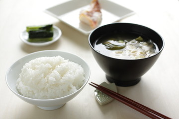Japanese cuisine, rice and tofu soup with grilled fish