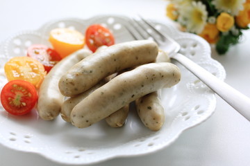 Western food, boiled sausage with cherry tomato