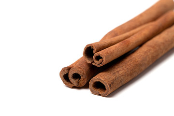 Cinnamon sticks on white background