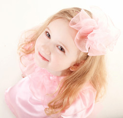 lovely little girl wearing pink dress