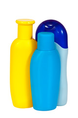 three toilletries bottles