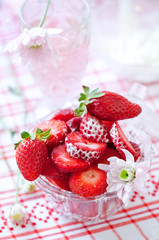 bowl of fresh strawberries on a table