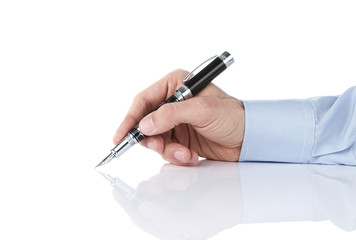 Human hand writing with pen isolated on white background