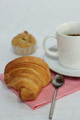 Croissant and a cup of coffee