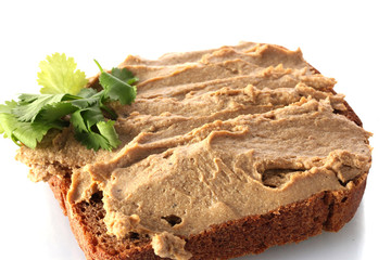 Fresh pate on bread isolated on white