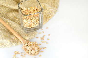 oat-flakes with a wooden spoon