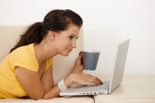 Young female using laptop