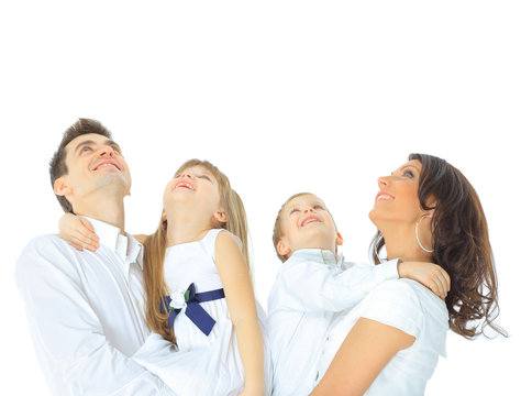 Harmonious Family Laying Down And Looking Up