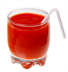 A glass of tomato juice and a straw isolated on a white backgrou