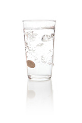 coin money dropped in to water