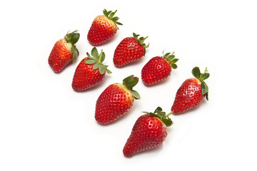 Strawberries isolated on a white studio background.