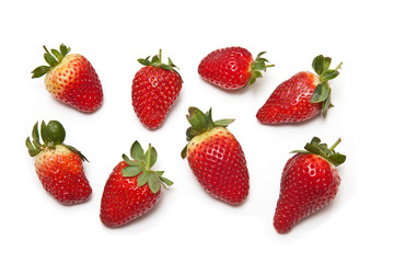 Strawberries isolated on a white studio background.
