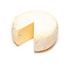 Petit Reblochon cheese isolated on a white studio background.