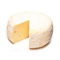 Petit Reblochon cheese isolated on a white studio background.