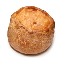 Melton Mowbray pork pie  isolated on a white studio background.