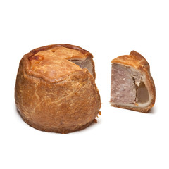 Melton Mowbray pork pie  isolated on a white studio background.