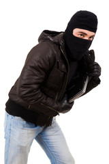 Thief holding a laptop, isolated over white background