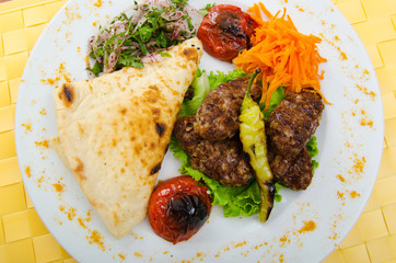 Meat cuisine - kebab served in plate