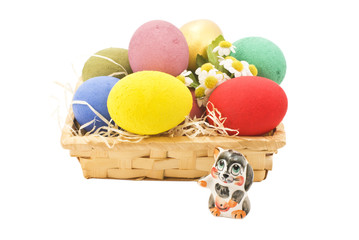colored eggs in a basket
