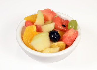 Fruit salad on white context.