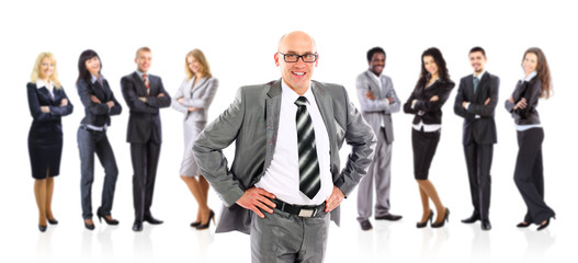 Male Businessman leader standing in front of his team