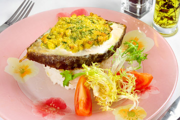 steak of fish with rice garnish