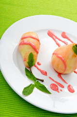 Dessert with pear in sauce