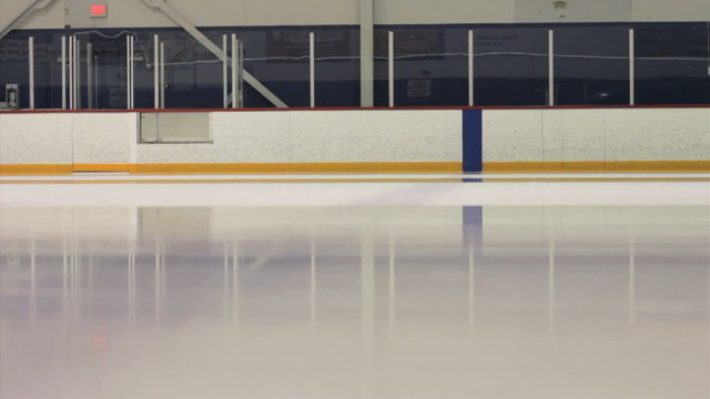Ice Making Machine Cruises By On Rink