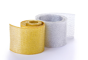 beautiful golden and silver ribbons isolated on white