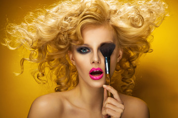 Fototapeta premium Portrait of a sexy woman with brush