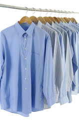 Mix color clothes on Hangers with man's shirts