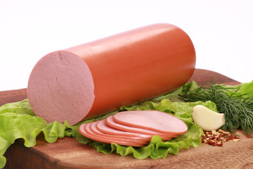 Still Life with ham on a wooden table