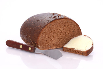 Bread, slice of bread with butter and butter knife